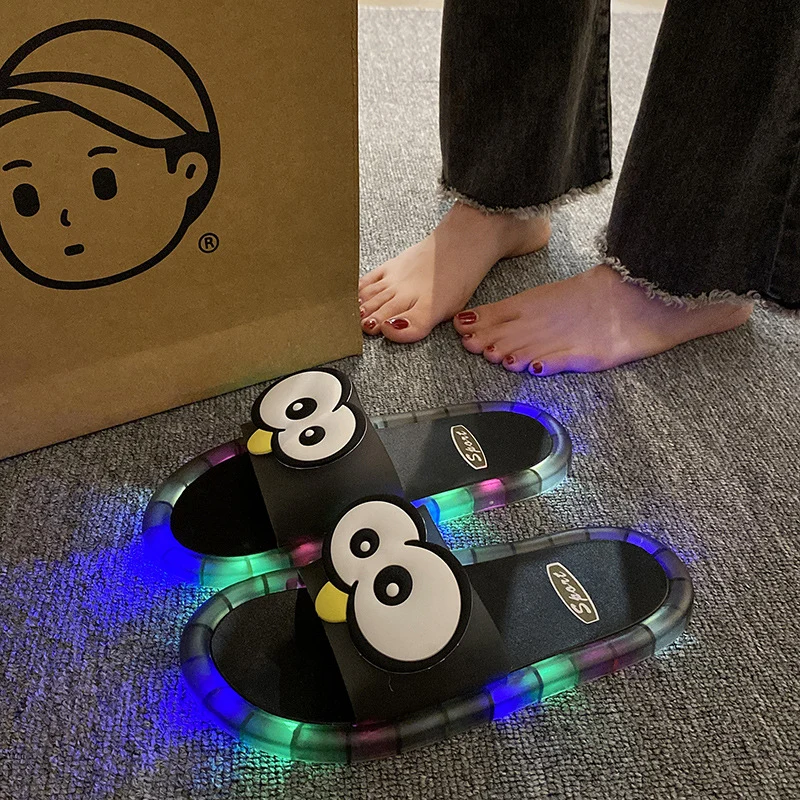 ๐ง 50% OFF NOW! ๐ก LED Cartoon Slippers โ Vibrant Light-Up Sole & Cute Penguin Design โ Flexible PVC & Easy Slip-On ๐ - Image 9