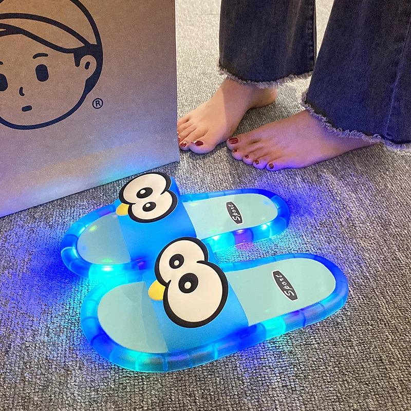 ๐ง 50% OFF NOW! ๐ก LED Cartoon Slippers โ Vibrant Light-Up Sole & Cute Penguin Design โ Flexible PVC & Easy Slip-On ๐ - Image 7