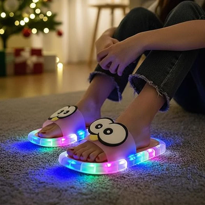 ๐ง 50% OFF NOW! ๐ก LED Cartoon Slippers โ Vibrant Light-Up Sole & Cute Penguin Design โ Flexible PVC & Easy Slip-On ๐ - Image 3